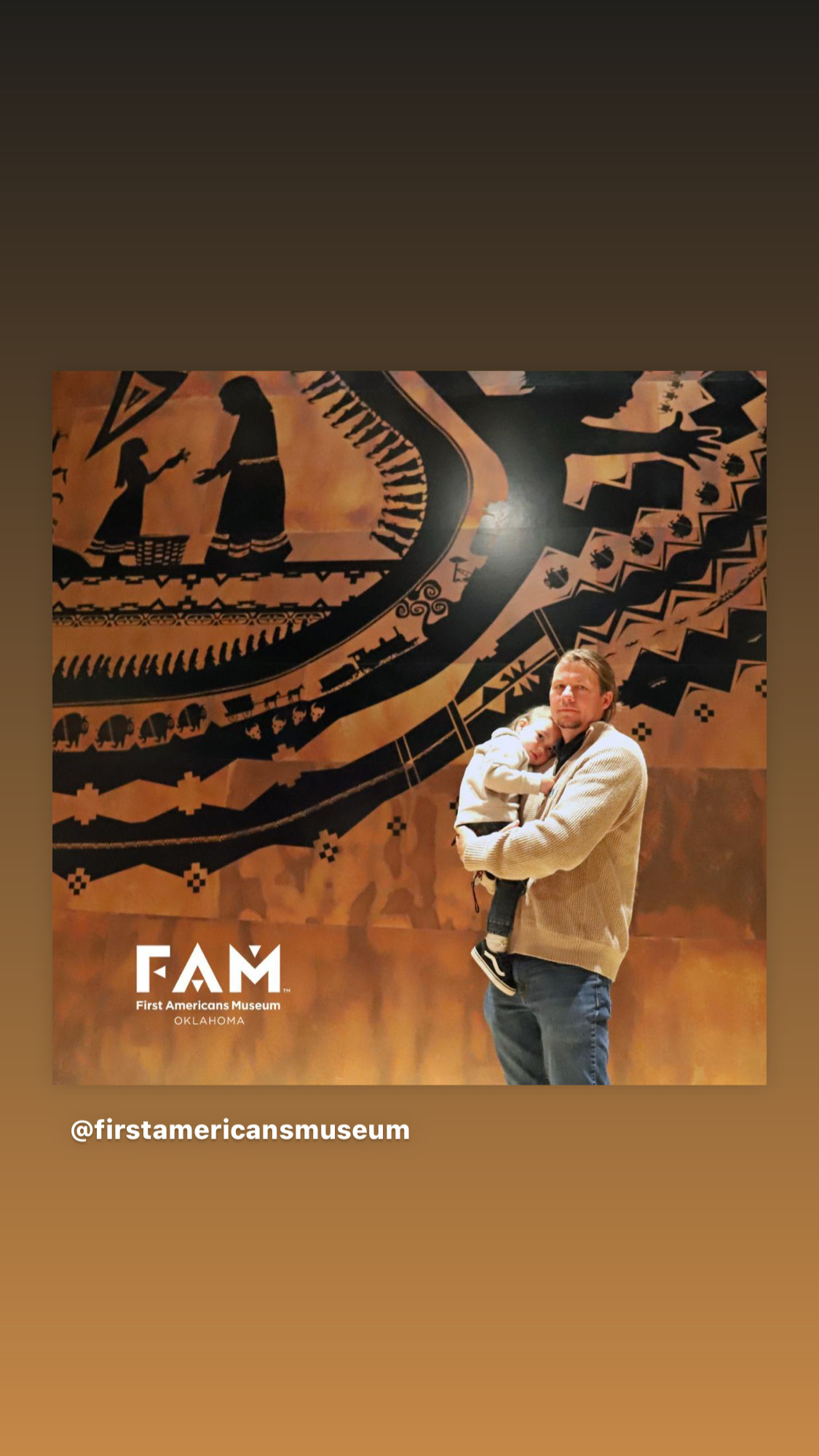 Joseph Lewis Erb and ᎠᎹᏱ Lewis Erb standing in front of the permit installation of Joseph’s work , “Indigenous Brilliants”, commissioned by the First American Museum (FAM) in Oklahoma City. FAM represents 39 tribal nations. 