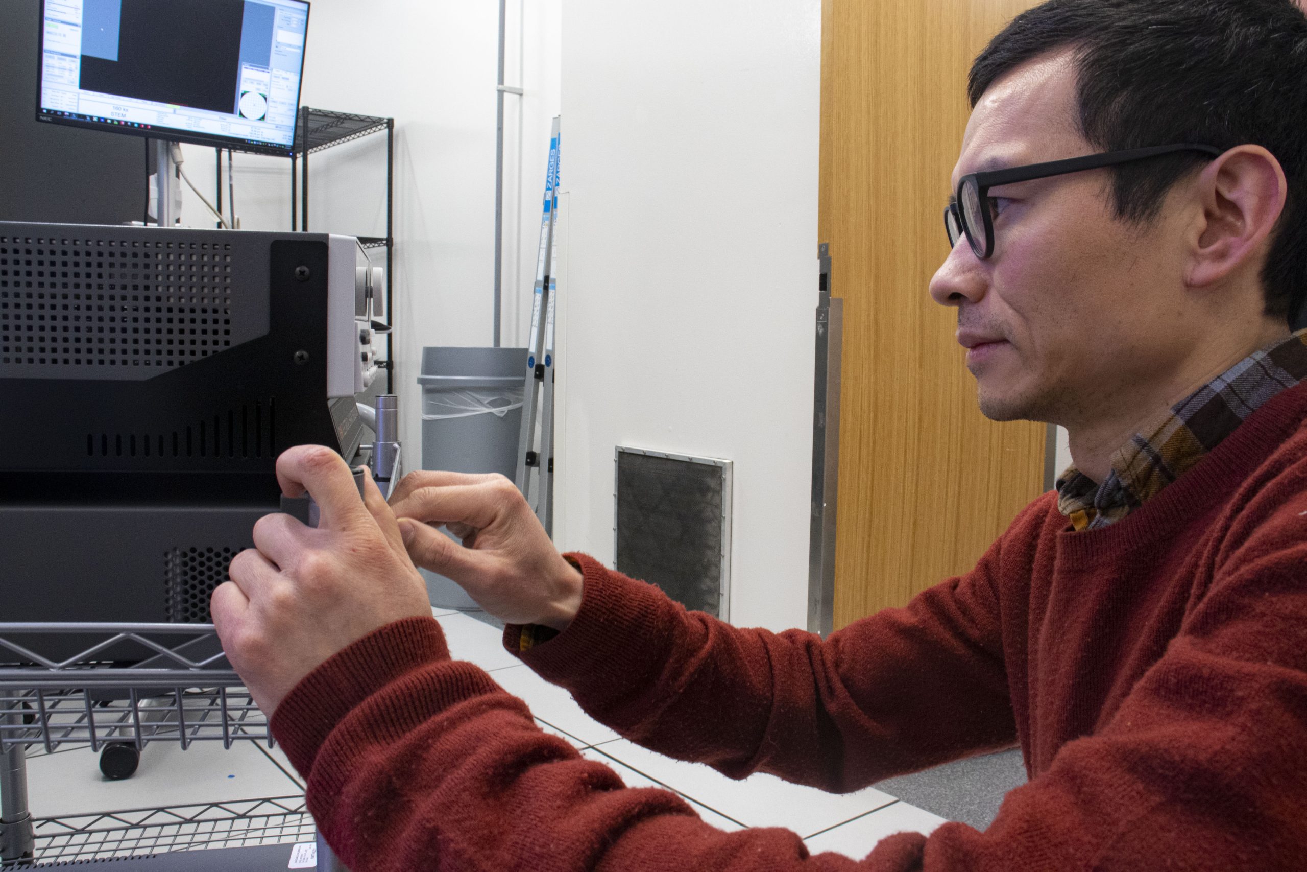 researcher working with machine