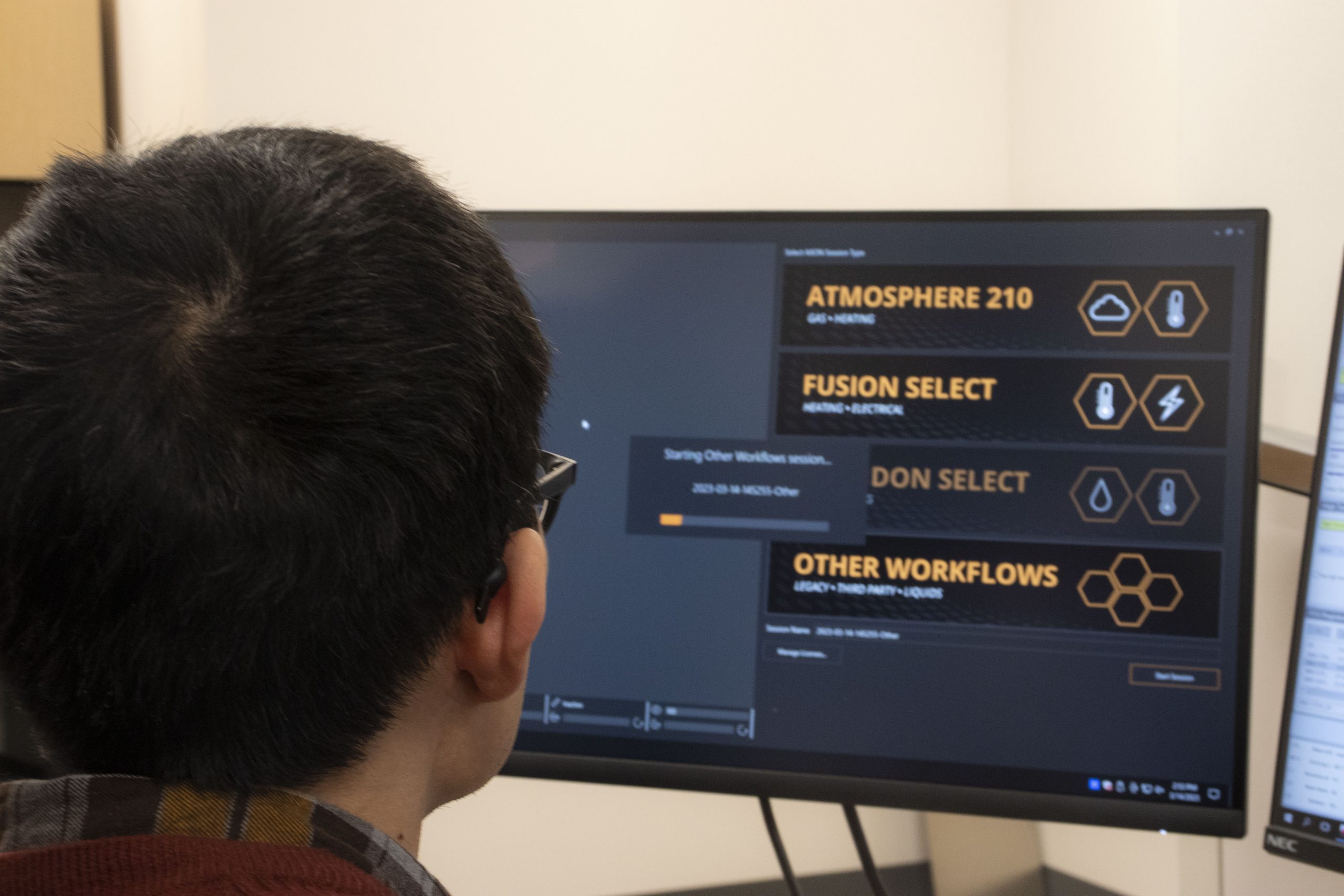 researcher on computer