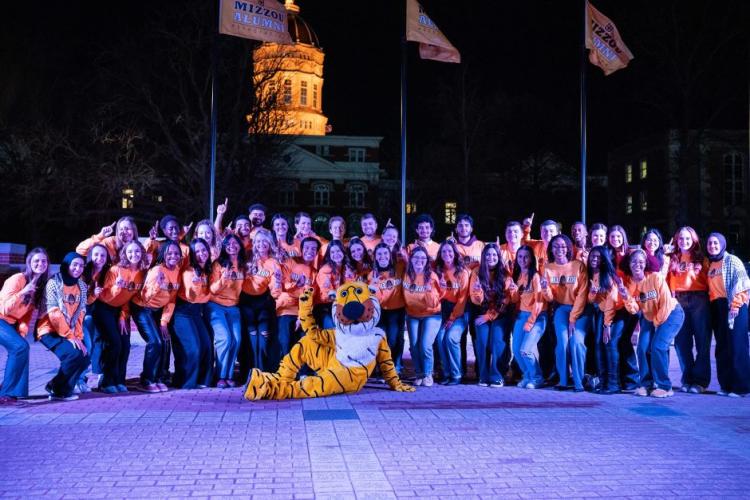 The Mizzou 18 and Mizzou ’39 award recipients with Truman Tiger at Traditions Plaza. Photo by Sam E Cox