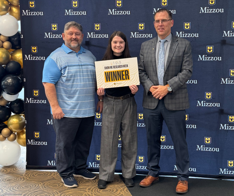 Matthew McIntosh, Kaitlyn Koob, and Provost and Executive Vice Chancellor Matthew Martens